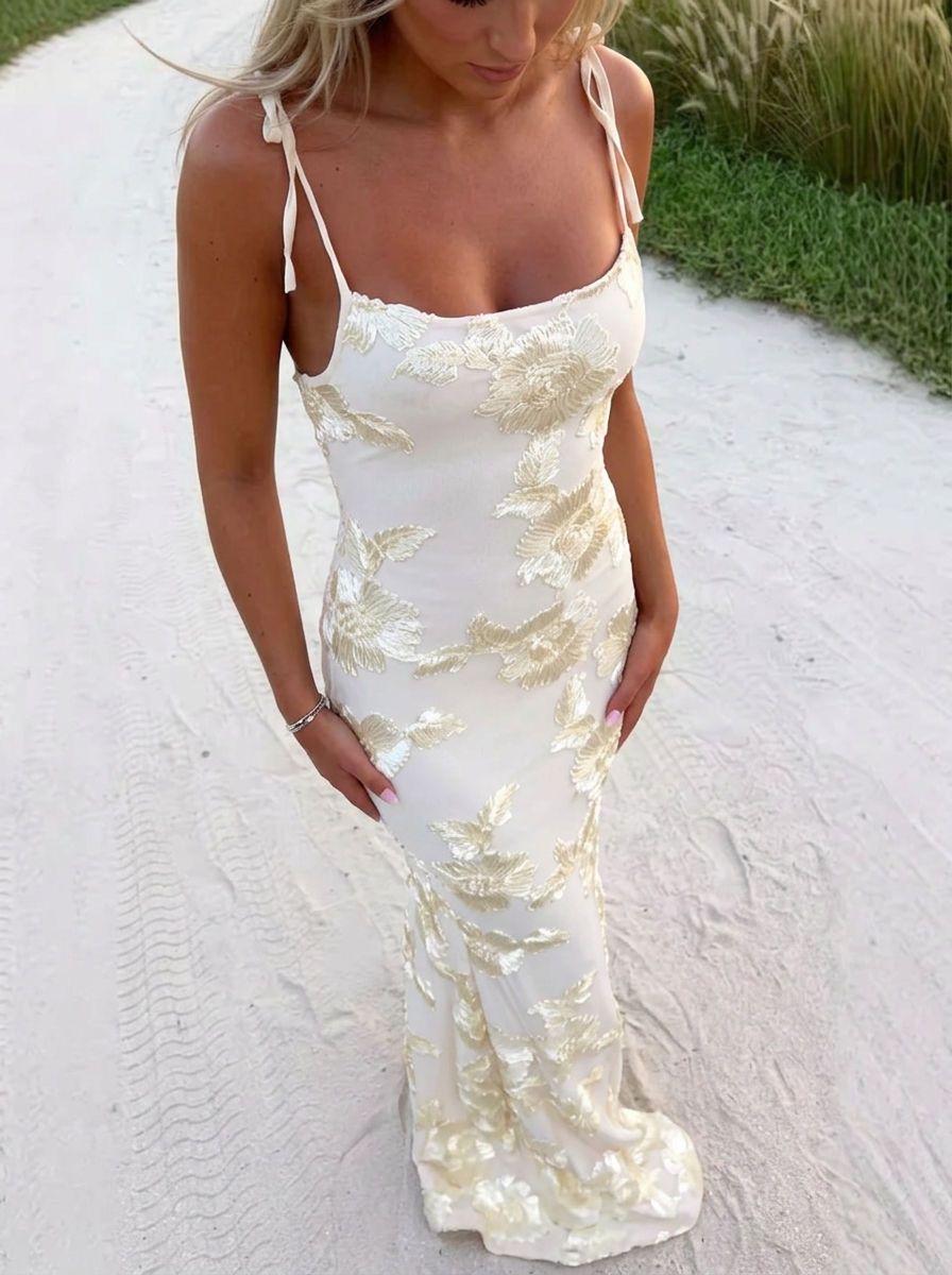 White floral embroidered maxi dress Chloe on light background